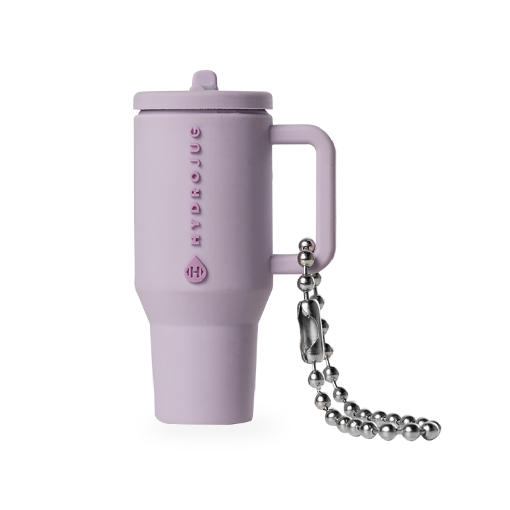 traveler-keychain-y5 Web-ProductImages-TravelerKeychain-Lilac_f123c953-a3fb-415a-af3f-d2af25b74904.png