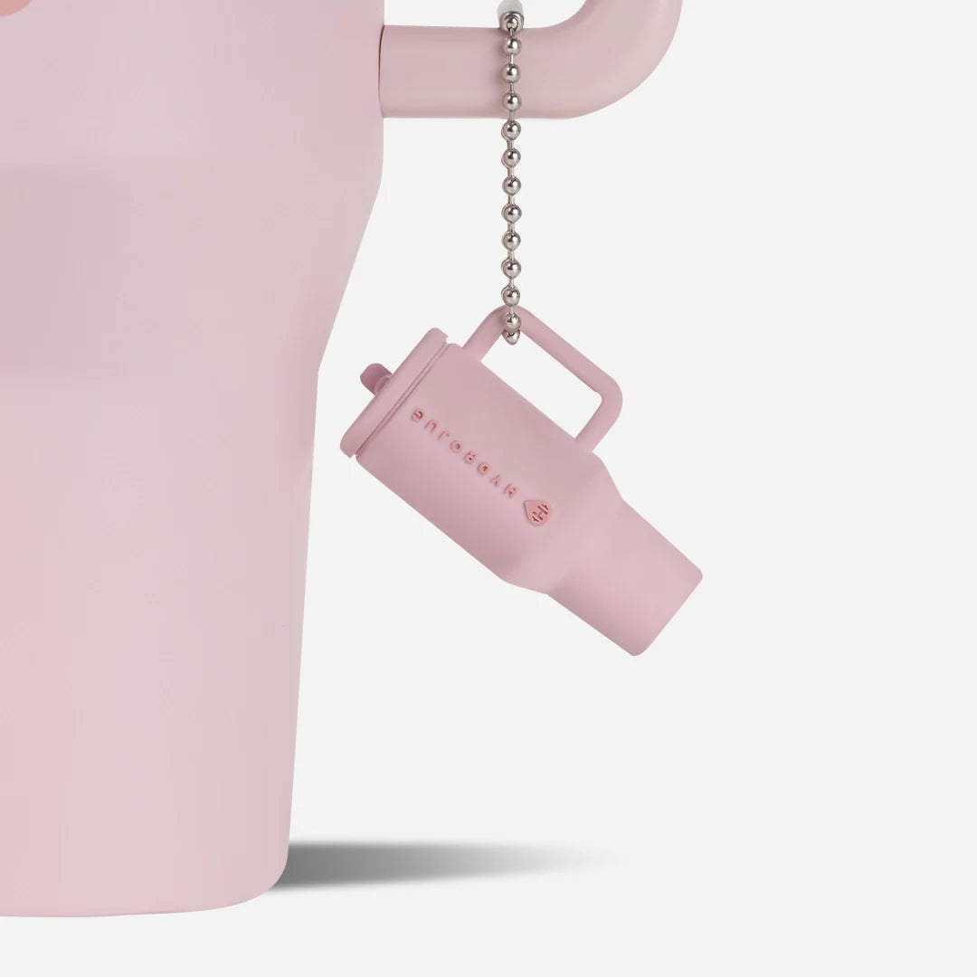 traveler-keychain-y5 Web-TravelerKeychainPhotos-PinkSand2.webp